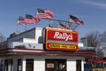 Rally`s Drive Thru fast food restaurant. Rally`s is the sister of Checkers