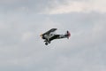 Munderloh, Germany - August 18, 2019: An old American biplane flies over the small airfield