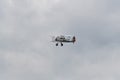 Munderloh, Germany - August 18, 2019: An old American biplane flies over the small airfield