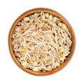 Mung bean sprouts in a wooden bowl, from above, isolated, on white background Royalty Free Stock Photo