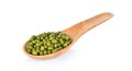 Mung beans in wooden spoon isolated on white background Royalty Free Stock Photo