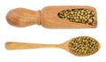 Mung beans in a wooden spoon isolated on white background. Top view Royalty Free Stock Photo