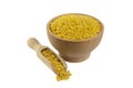 Mung dal or Mung daal bean in wooden bowl and scoop isolated on white background. nutrition. bio. natural food ingredient