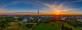 Munich, bavaria. Breathtaking view at the bavarian capital at orange sunrise with typical landmarks for tourism