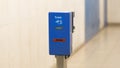 Close up of a blue colored ticket validator