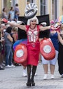 018: A drag queen dressed up like a female red Volkswagen car attending the Gay Pride parade also known as Christopher Street Day