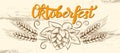 Munich Beer Festival Oktoberfest handwritten text with line art illustration of wheat heads and hop cones on wooden texture backgr