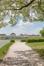 MUNICH, GERMANY - APRIL 25, 2018: Front side of Nymphenburg Palace Schloss Nymphenburg from walkway