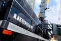 Liebherr logo on a black crane