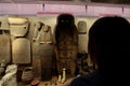 The Hall of Sarcophagi and other Egyptian objects displayed inside the Egyptian State Museum of Munich.