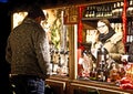Munich, Germany Christmas market at Harras, liqueurs and schnaps stall Royalty Free Stock Photo