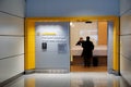 MUNICH, GERMANY - JAN 21st, 2017: airport interior, airport Lufthansa senator lounge entrance with business man checking