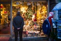 Man looking at Store window Royalty Free Stock Photo