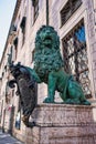 Munich, Germany - Jul 27, 2020: Bavarian lion statue at Alte Residenz palace in Odeonplatz. Munich, Germany