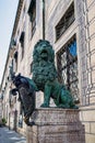 Munich, Germany - Jul 27, 2020: Bavarian lion statue at Alte Residenz palace in Odeonplatz. Munich, Germany