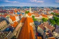 Munich, Germany - July 30, 2015: Beautiful overview over city taken from high up, showing rooftops strecthing far as eye