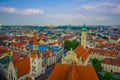 Munich, Germany - July 30, 2015: Beautiful overview over city taken from high up, showing rooftops strecthing far as eye