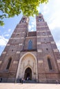 Munich, Germany - July 6, 2022: Looking up at the two towers of the Frauenkirche MÃÂ¼nchen. Cathedral of Our Dear Lady is a Royalty Free Stock Photo