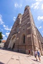 Munich, Germany - July 6, 2022: Looking up at the two towers of the Frauenkirche MÃÂ¼nchen. Cathedral of Our Dear Lady is a