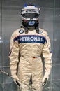 Munich, Germany - March 10, 2016: Formula One suit of BMW race car driver wearing protective leather and helmet Royalty Free Stock Photo