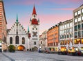 Munich - Germany, Marienplatz at dramtic sunrise with red clouds - nobody Royalty Free Stock Photo