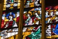 Ancient stained glass windows on a religious theme in the Cathedral of the Blessed Virgin Mary in Munich Germany.