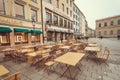 Street with tables of the historical beer bar in old bavarian city Royalty Free Stock Photo