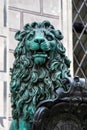 Munich, Germany - Oct 17, 2020: Bavarian lion statue at Alte Residenz palace in Odeonplatz. Munich, Germany