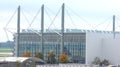 MUNICH, GERMANY - 11 OCTOBER 2015: An aircraft hangar as a tall glass building at Munich international airport MUC Royalty Free Stock Photo