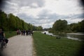 MUNICH, GERMANY - People sunbathing in English Garden in Munich Bavaria