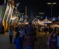 Munich, Germany - September 24: a father is carrying his young son on his shoulders on the oktoberfest in munich at night