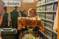 MUNICH, GERMANY - SEPTEMBER 17, 2016: Waitress carrying many beer glasses at the Oktoberfest in Muni