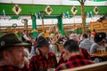 Waitress selling brezels in beer tent