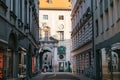 Munich, October 29, 2017: Perspective view of alley, narrow street intersection surrounded by modern and historical