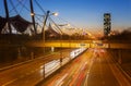 The Munich ring road `Mittlerer Ring` middle ring road during the blue hour / twilight. An office tower in the background Royalty Free Stock Photo