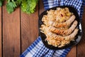 Munich sausages with fried cabbage. Royalty Free Stock Photo