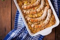 Munich sausages with fried cabbage. Royalty Free Stock Photo