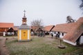 Municipal Belfry, small church on village green, Traditional historic country-style architecture in Skanzen, Polabi open-air