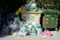 Municipal bins with plastic and aluminum waste overflowing with containers...Municipal waste overflows with containers