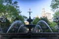 The Municipal Building towers over the fountain in City Hall Park in NYC Royalty Free Stock Photo