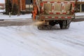 municipal car for sprinkle half the salt and sand on roads with snow