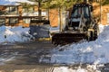 Municipal equipment removing snow outdoors cleaning roads in winter Royalty Free Stock Photo