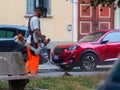 Municipal gardener cutting weed from lawn in the city