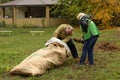 Municipal sweepers clean park from leaves with rakes loading them in a bag