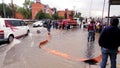 Municipal workers deplete the sewers during the flood.