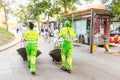 Municipal workers janitors at the city street