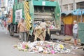 Municipality workers Clearing the wastage