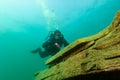 Munising, MI -August 14th, 2021: SCUBA diver exploring Lake Superior