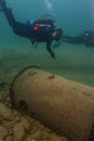 Munising, MI -August 14th, 2021: SCUBA diver exploring wooden steamer shipwreck