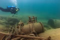 Munising, MI -August 14th, 2021: SCUBA diver exploring wooden steamer shipwreck